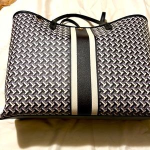 Tory Burch large tote with matching wallet.